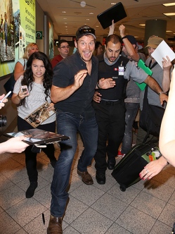 EXCLUSIVE: Chris Pratt is swarmed by fans and autograph seekers as he arrives in Toronto