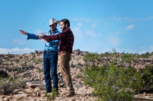 NOCTURNAL ANIMALS, from left: director Tom Ford, Jake Gyllenhaal, on set, 2016. ph: Merrick Morton/